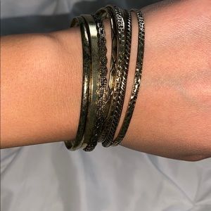 Assorted gold bangle bracelets